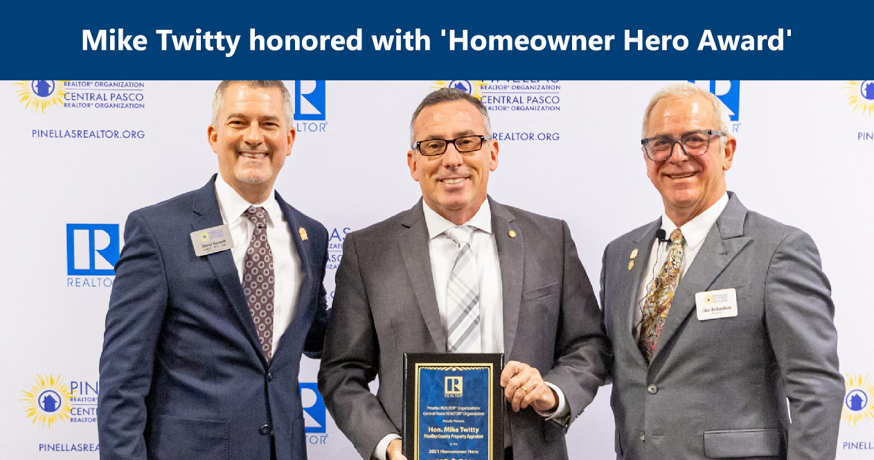 Image: Mike Twitty receiving the homeowner hero award